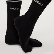 Black sports socks for men and women made of cotton