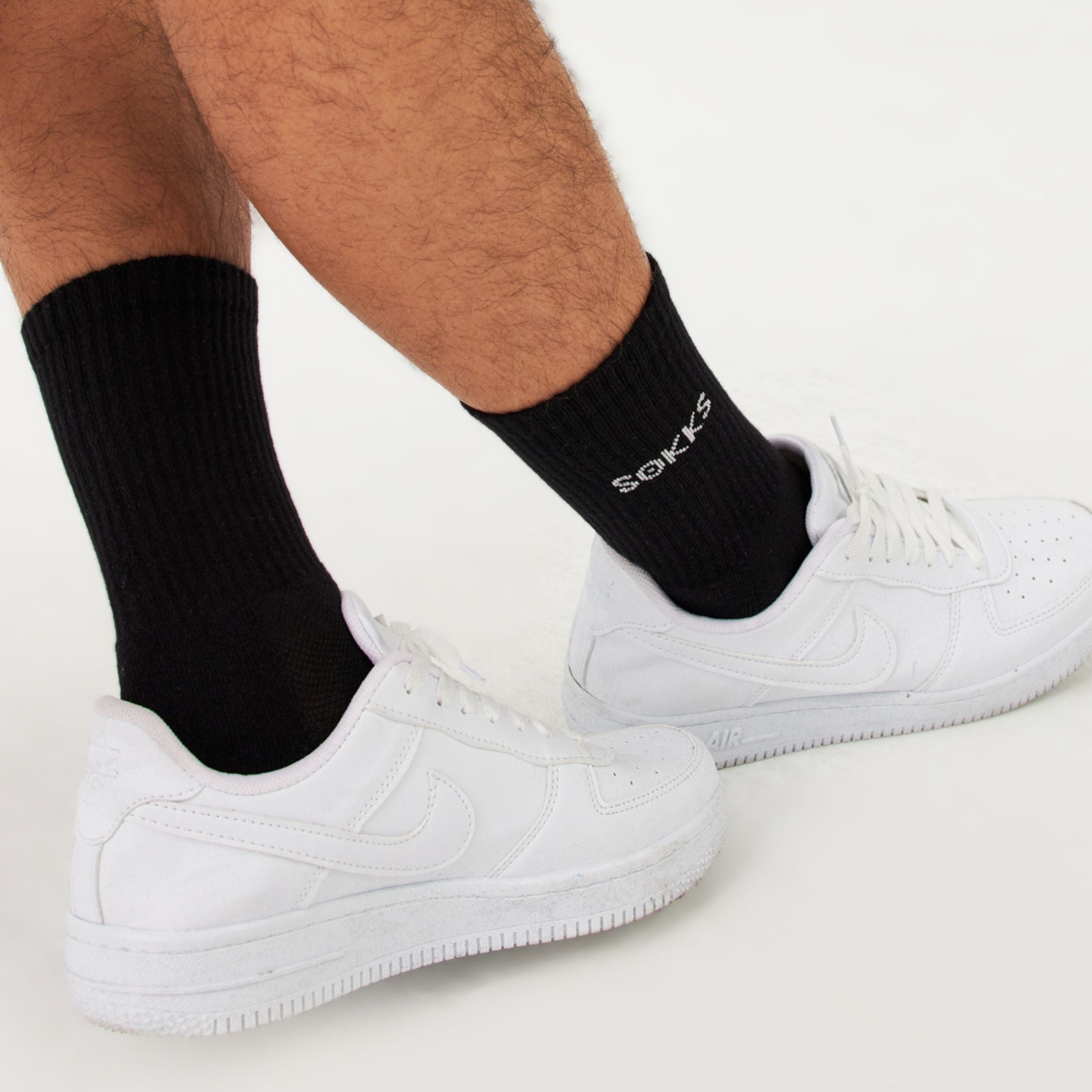 Black high running socks for men and women made of cotton